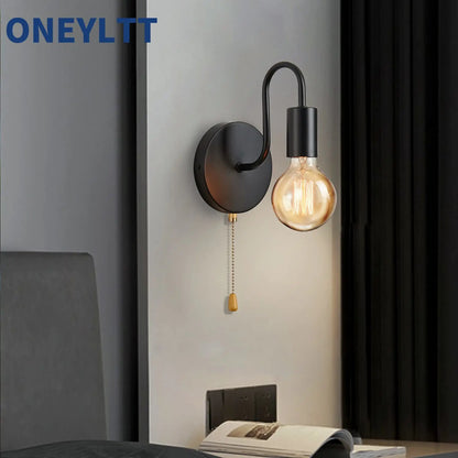 Industriell vägglampa i svart järn