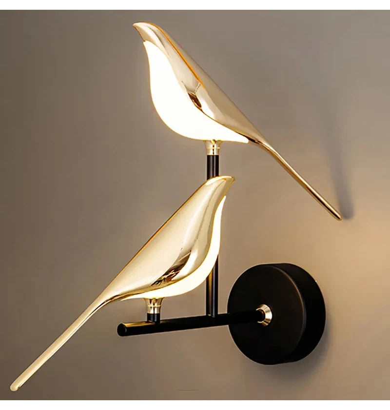 Vägglampa i fågelform, guld