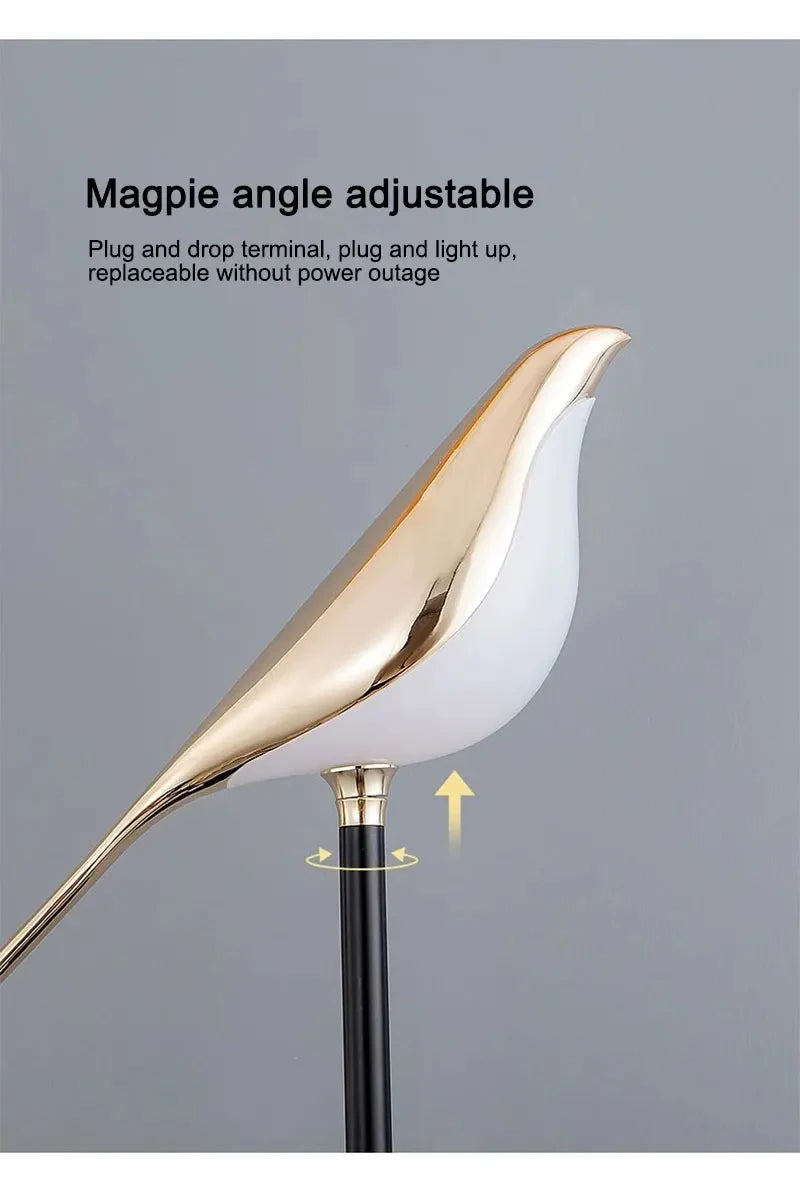 Vägglampa i fågelform, guld