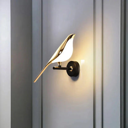 Vägglampa i fågelform, guld