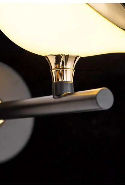 Vägglampa i fågelform, guld