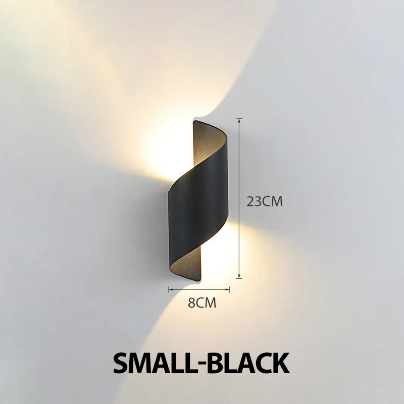 Vägglampa med spiralformad design