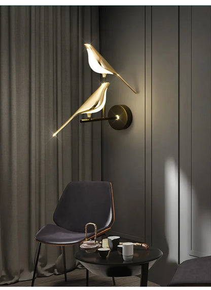 Vägglampa i fågelform, guld
