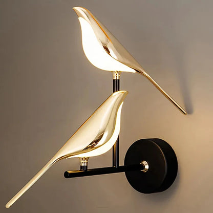 Vägglampa i fågelform, guld