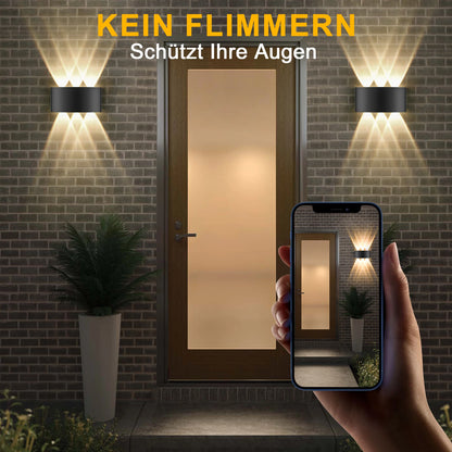 Vägglampa med flera ljusstrålar
