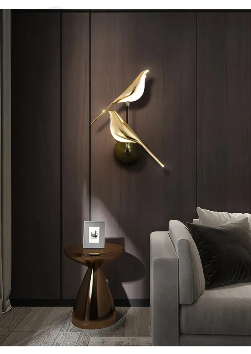 Vägglampa i fågelform, guld