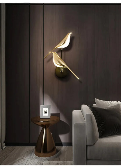 Vägglampa i fågelform, guld