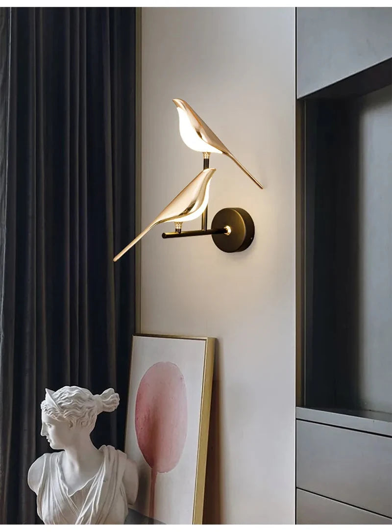 Vägglampa i fågelform, guld
