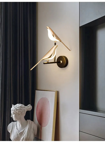 Vägglampa i fågelform, guld