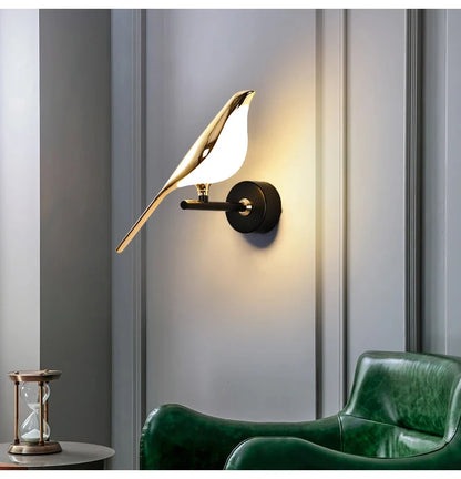 Vägglampa i fågelform, guld